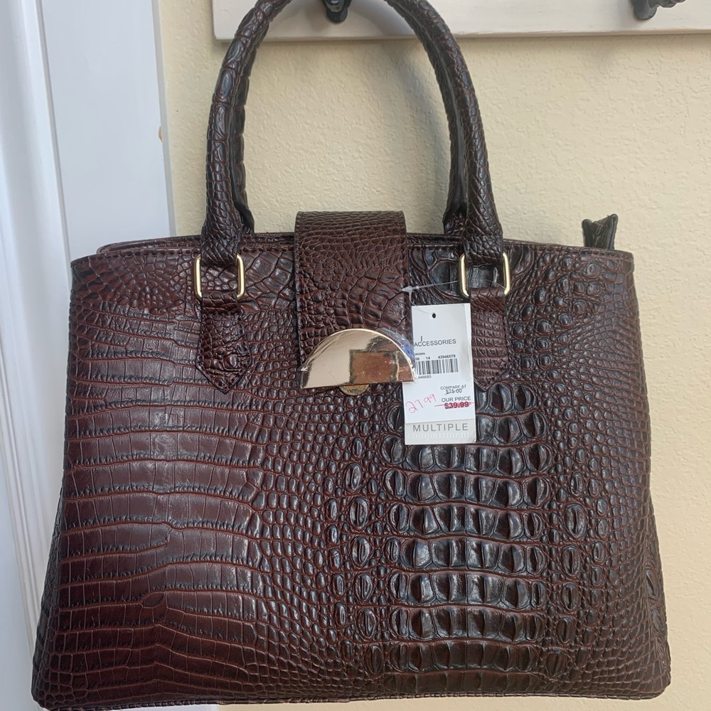 Brown faux alligator skin handbag.